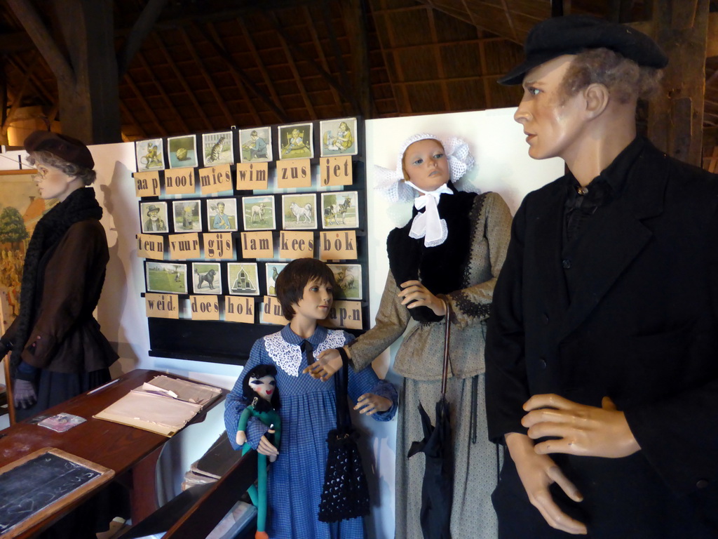Wax statues and `leesplankje` at the Hooiberg room of the `t Olde Maat Uus museum
