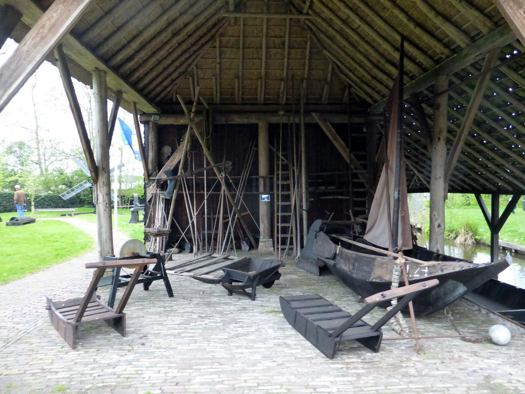 Boat and farming equipment at the courtyard of the `t Olde Maat Uus museum