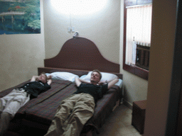 Rick and David on the bed in our room in the Colva Beach Resort