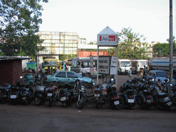 Mopeds and buses at the bus station of Margao