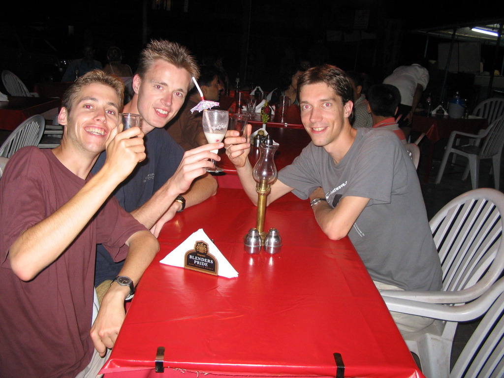 Tim, Rick and David with drinks at a restaurant at Colva Beach