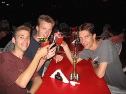 Tim, Rick and David with drinks at a restaurant at Colva Beach