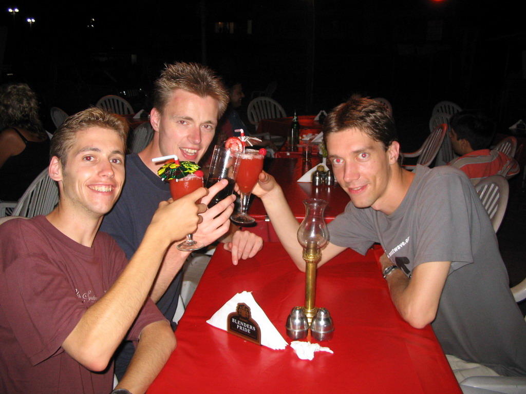 Tim, Rick and David with drinks at a restaurant at Colva Beach