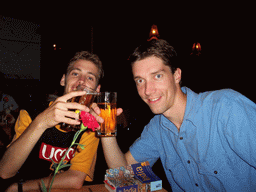 Tim and Rick with beers in a restaurant at Betalbatim