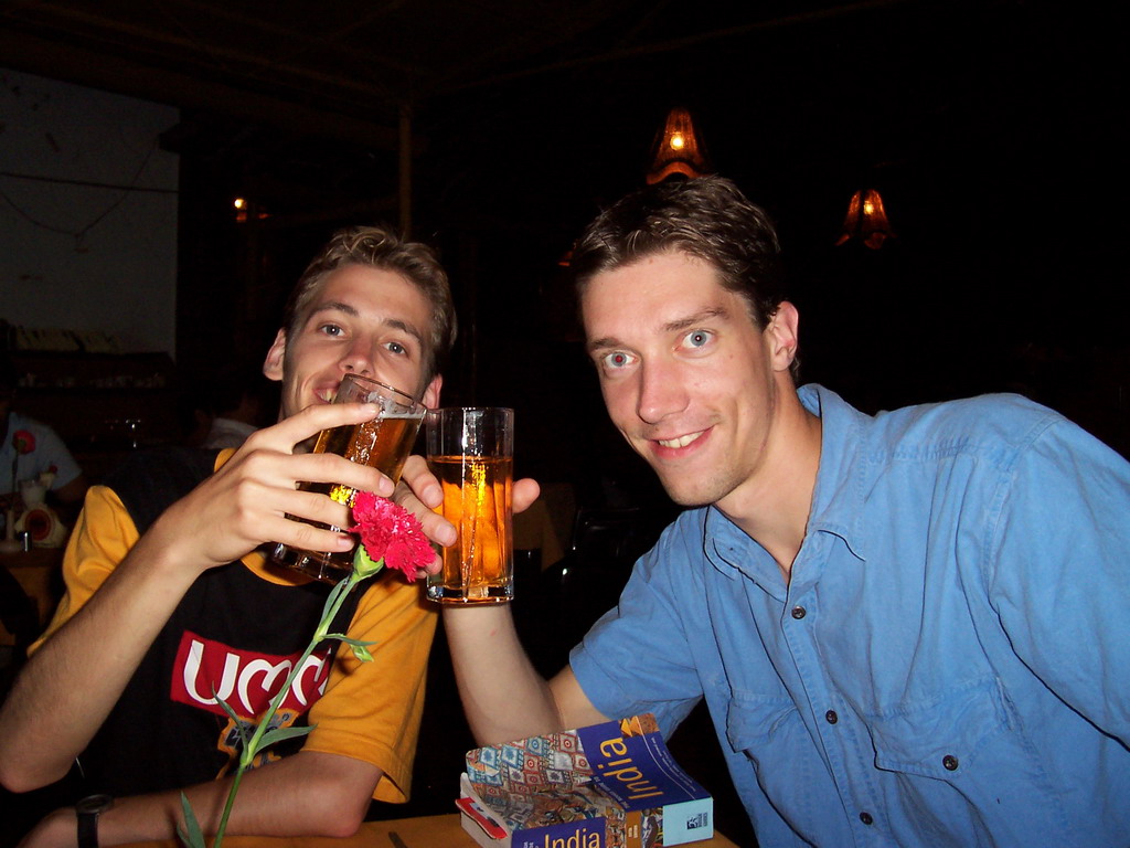 Tim and Rick with beers in a restaurant at Betalbatim