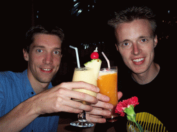 Tim and David with cocktails at a restaurant at Betalbatim