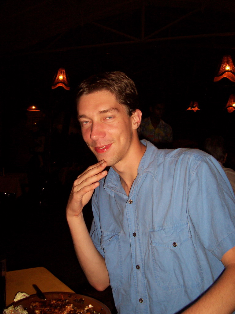 Tim with spicy kingfish at a restaurant at Betalbatim