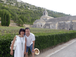Tim and Miaomiao with the lavender fields and the north side of the Abbaye Notre-Dame de Sénanque abbey