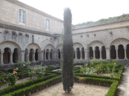 Southwest side of the cloister garden of the Abbaye Notre-Dame de Sénanque abbey
