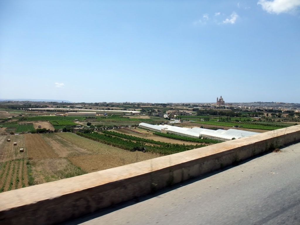 The town of Xewkija with the Church of St. John the Baptist and surroundings, viewed from the Gozo tour jeep