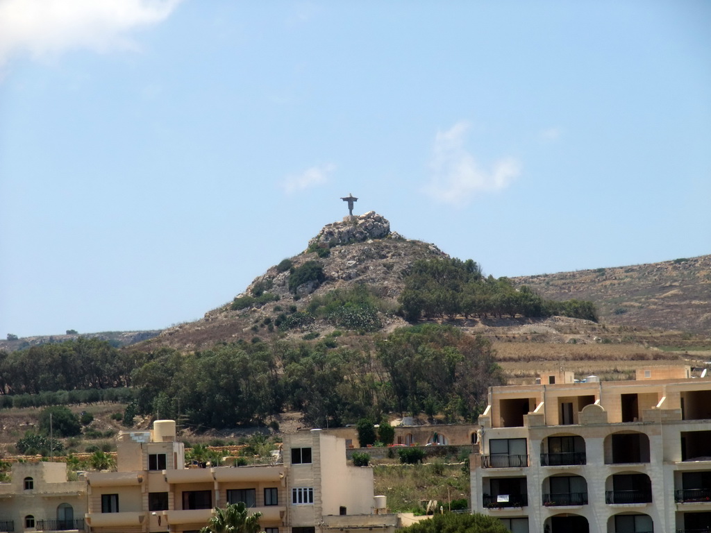 Statue of the Risen Christ on the Tal-Merzuq Hill, viewed from the Gozo tour jeep