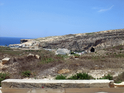 The Inland Sea and houses at Dwejra Bay, viewed from the Gozo tour jeep