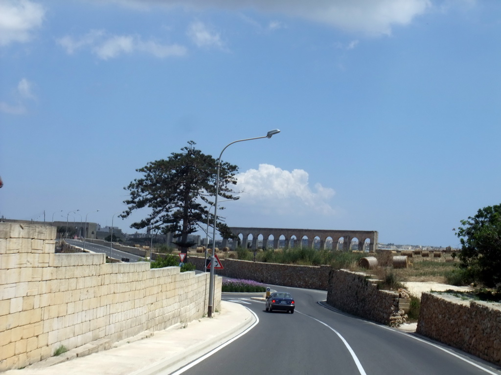 Old viaduct at the Triq L Gharb street from San Lawrenz to Victoria (Rabat), viewed from the Gozo tour jeep