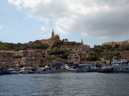 Mgarr Harbour and the town of Ghajnsielem with the Ghajnsielem Parish Church