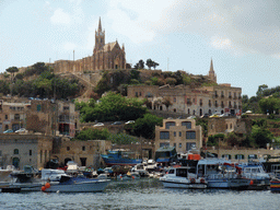 Mgarr Harbour and the town of Ghajnsielem with the Ghajnsielem Parish Church