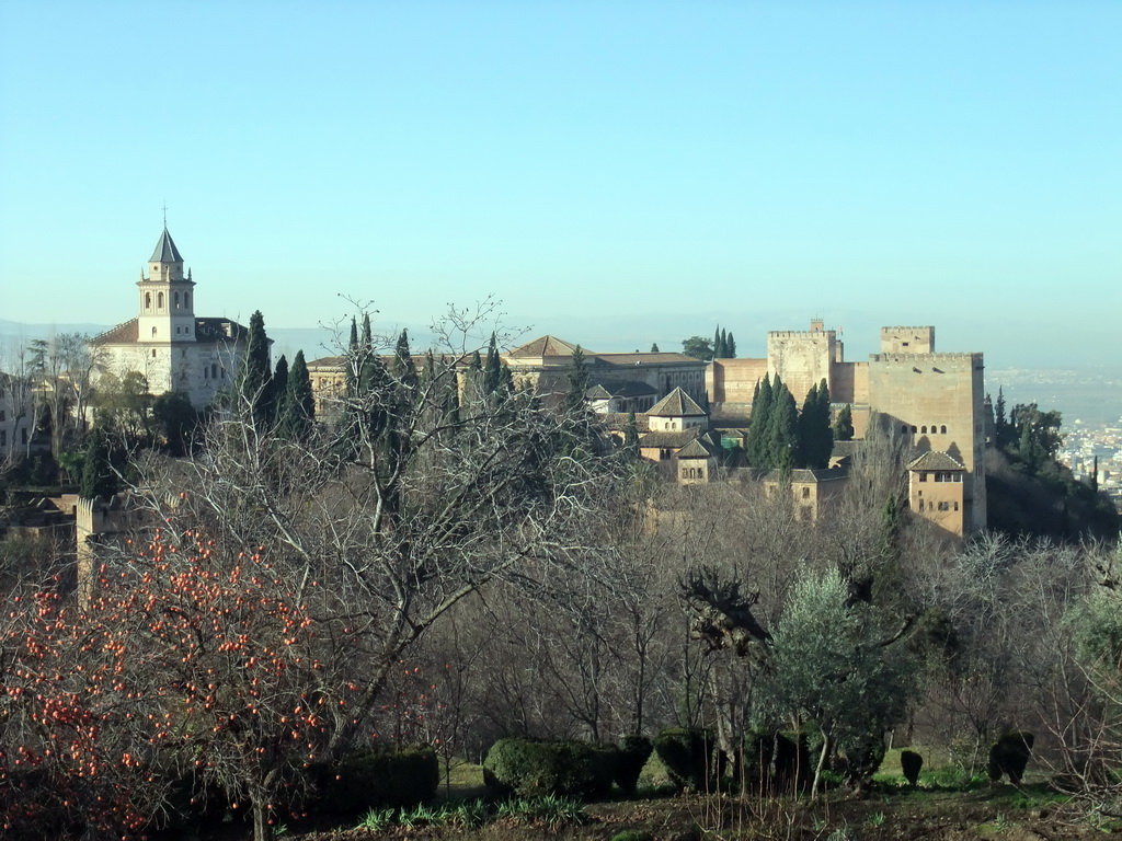 The Alhambra palace, viewed from the Patio de la Acquia courtyard at the Palacio de Generalife