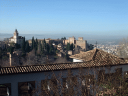 The Alhambra palace, the city of Granada and the Patio de la Acquia courtyard, viewed from the Jardines Altos gardens at the Palacio de Generalife