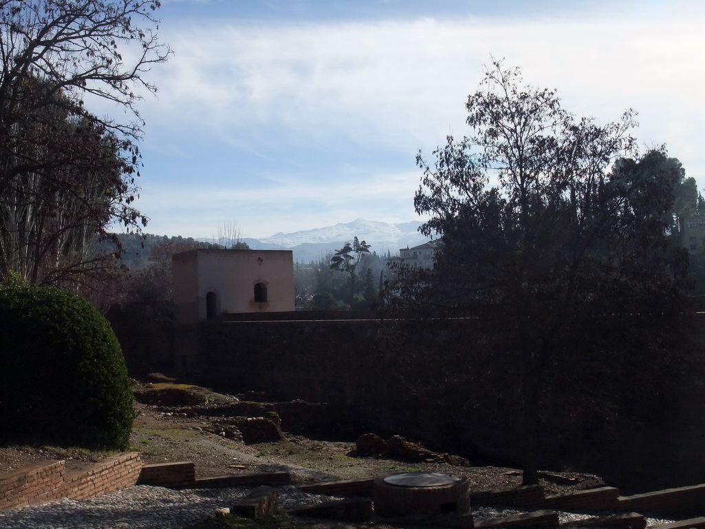 The Torre de Baltasar de la Cruz at the Alhambra palace, and the Sierra Nevada mountains