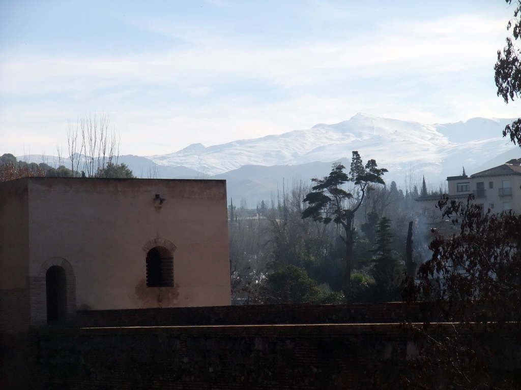 The Torre de Baltasar de la Cruz at the Alhambra palace, and the Sierra Nevada mountains