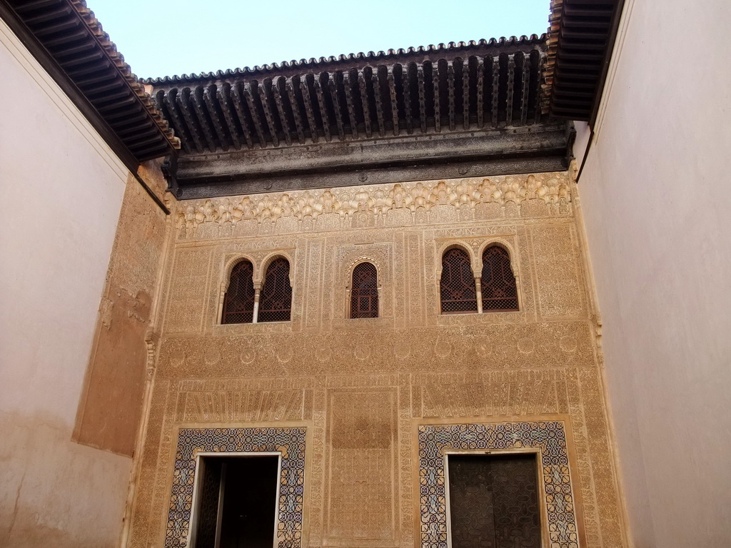 The Façade of Comares at the Patio del Cuarto Dorado courtyard at the Alhambra palace