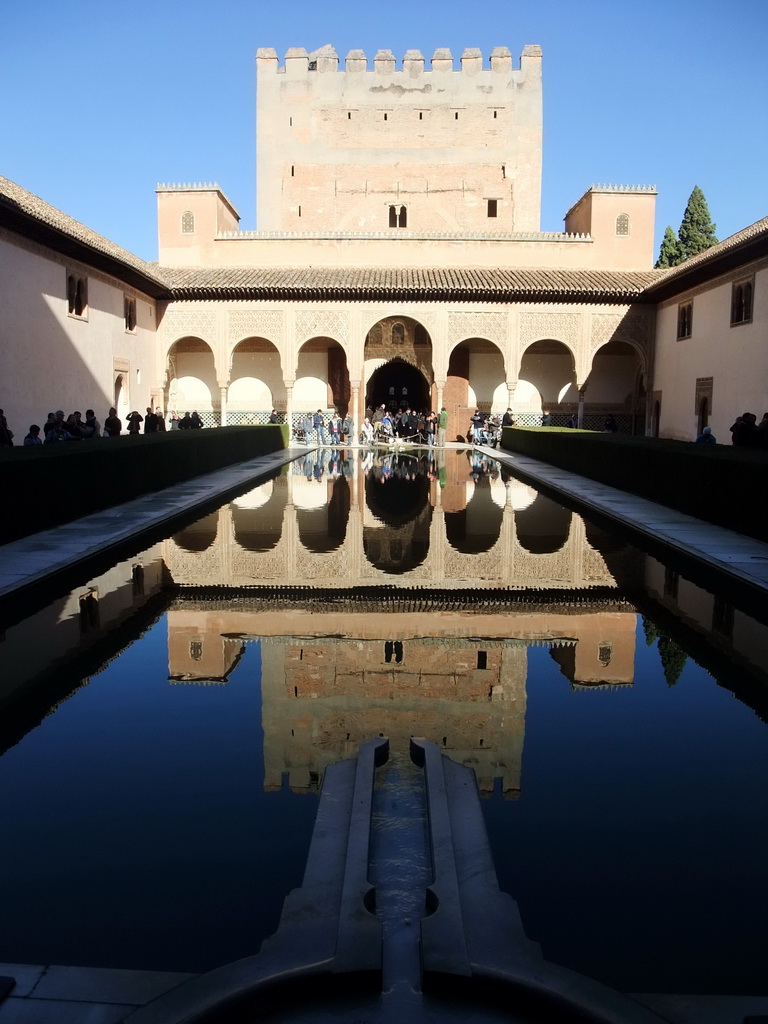 The pond at the Patio de los Arrayanes courtyard and the Salón de los Embajadores at the Alhambra palace