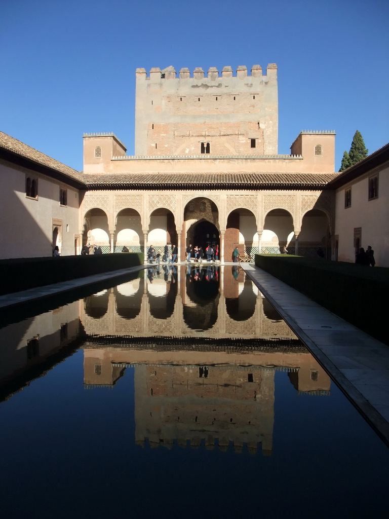 The pond at the Patio de los Arrayanes courtyard and the Salón de los Embajadores at the Alhambra palace