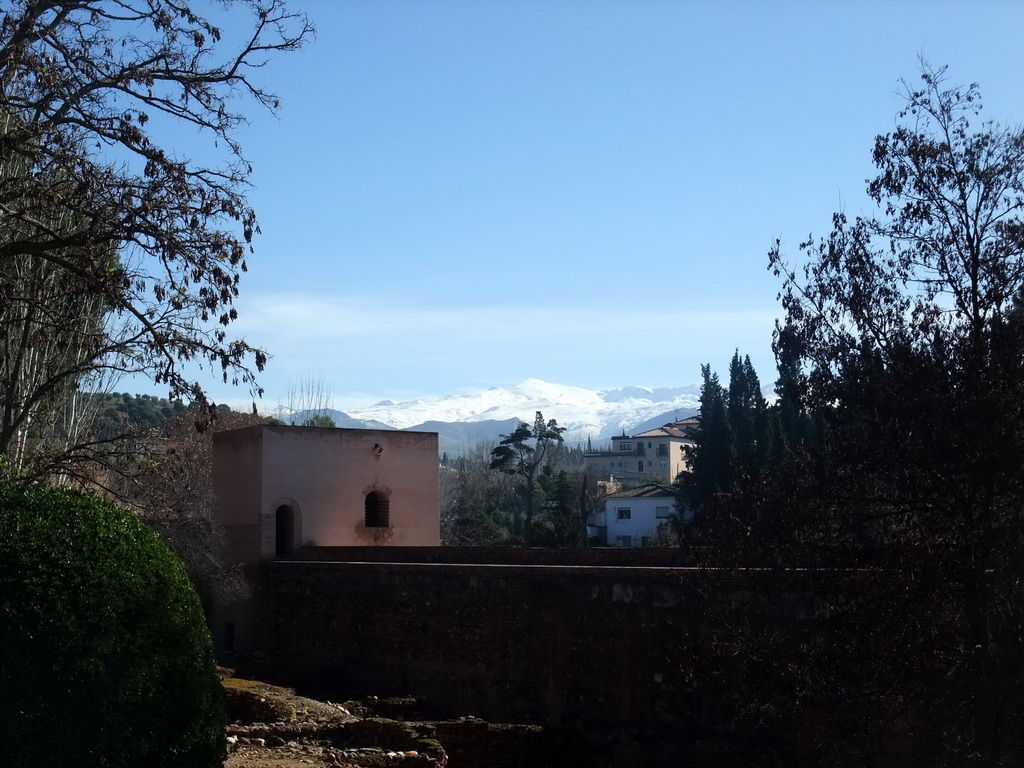 The Torre de Baltasar de la Cruz at the Alhambra palace, and the Sierra Nevada mountains