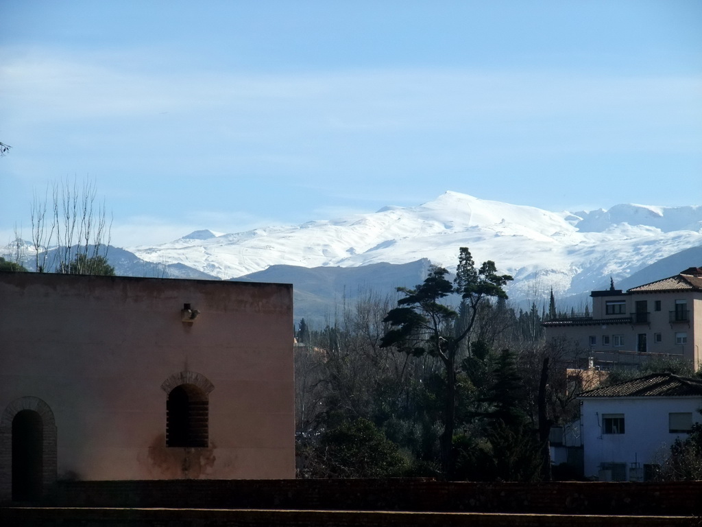 The Torre de Baltasar de la Cruz at the Alhambra palace, and the Sierra Nevada mountains