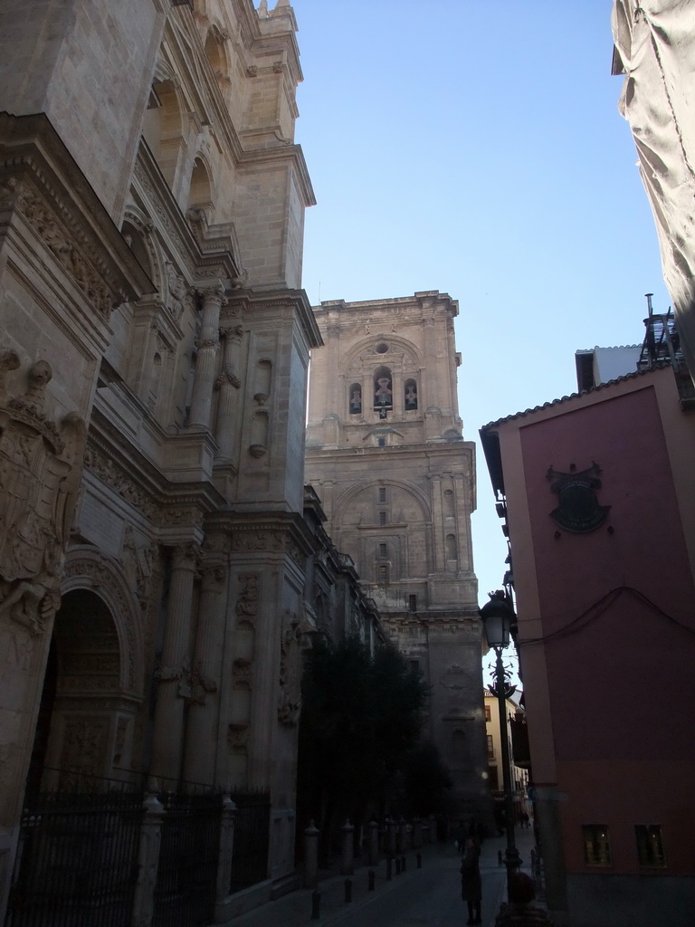 The tower and the northwest side of the Granada Cathedral, at the Calle de la Cárcel Baja street