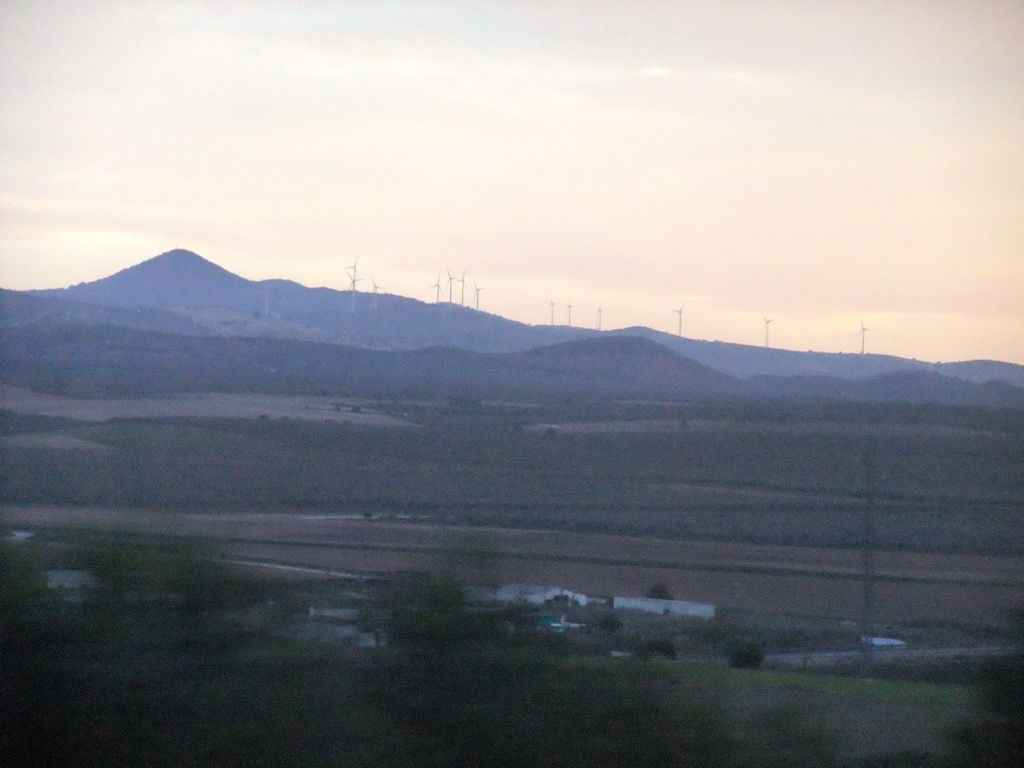 Wind mills on hills, viewed from our tour bus from Granada to Seville