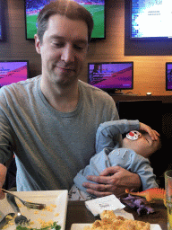 Tim and Max having lunch at Departure Lounge 4 at Gate M of Schiphol Airport