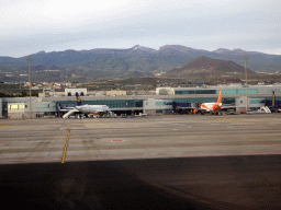 Airplanes at Tenerife South Airport and Mount Teide, viewed from the airplane to Amsterdam