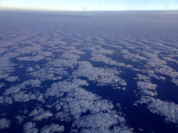 Cloudy sky above the Atlantic Ocean, viewed from the airplane to Amsterdam