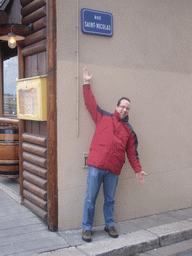 Paul and a street sign of Rue Saint-Nicolas