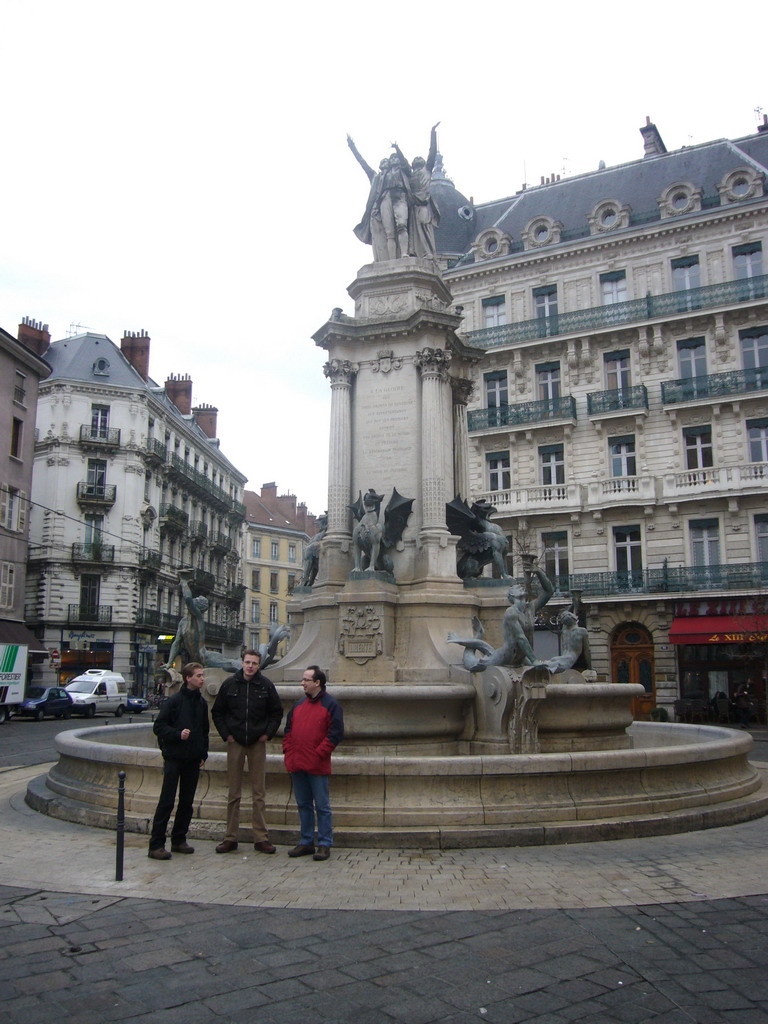 Rick, David and Paul at a fountain at the Place Notre-Dame square