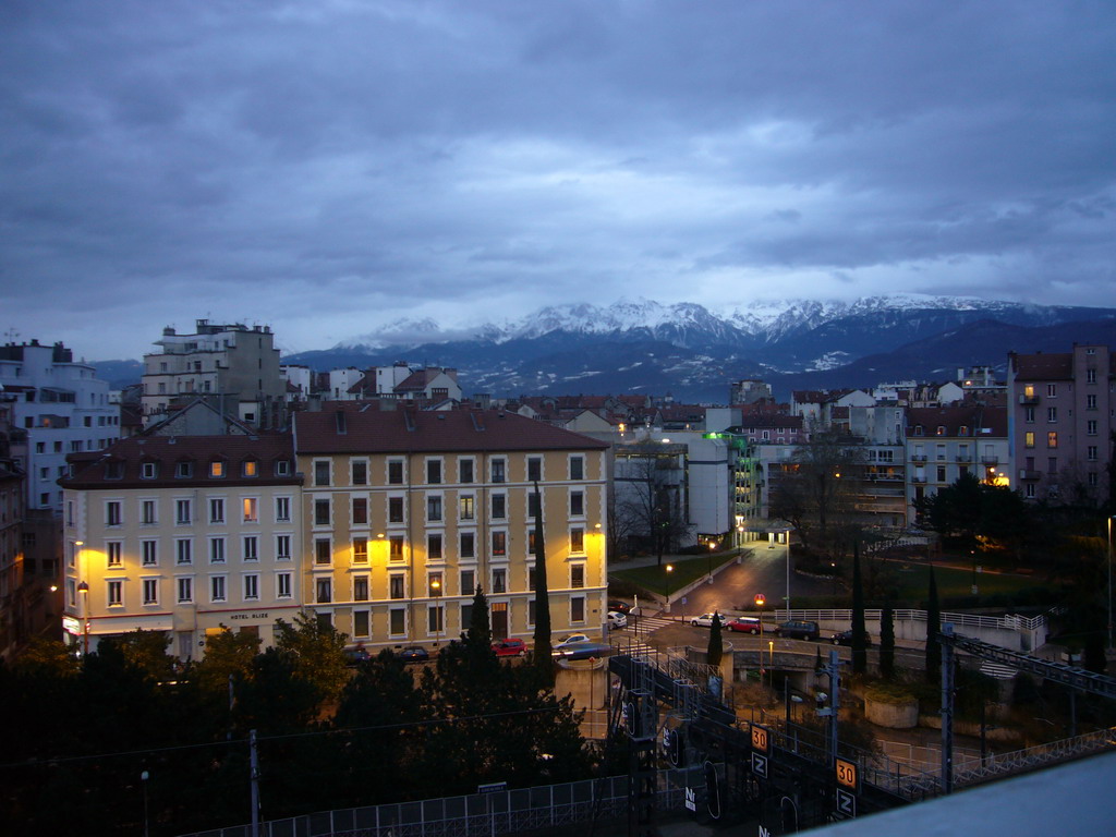 View on mountains and nearby houses from window of David`s apartment