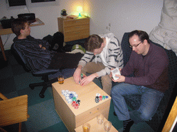 Rick, David and Paul playing poker in David`s apartment