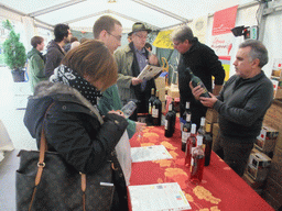 Miaomiao tasting wine at the Millesime Festival at the Place Victor Hugo square