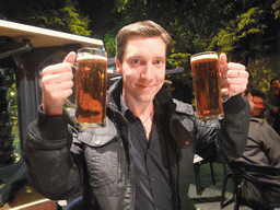 Tim with beers at a pub in the city center
