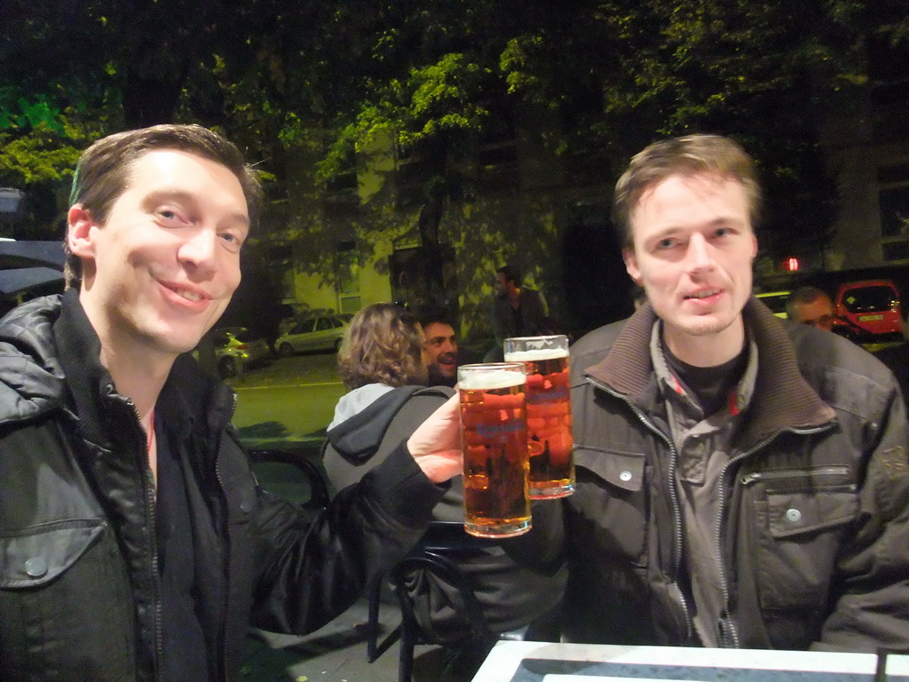 Tim with beers at a pub in the city center