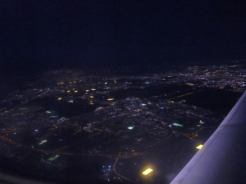 View on Amsterdam and surroundings from our airplane from Strasbourg to Amsterdam, by night