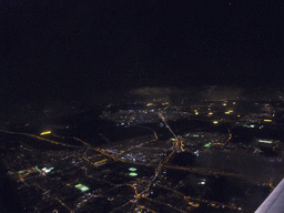 View on Amsterdam and surroundings from our airplane from Strasbourg to Amsterdam, by night