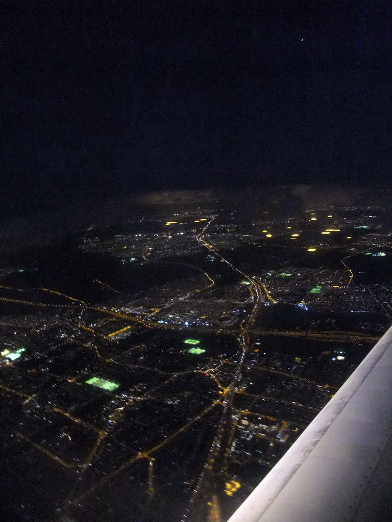 View on Amsterdam and surroundings from our airplane from Strasbourg to Amsterdam, by night