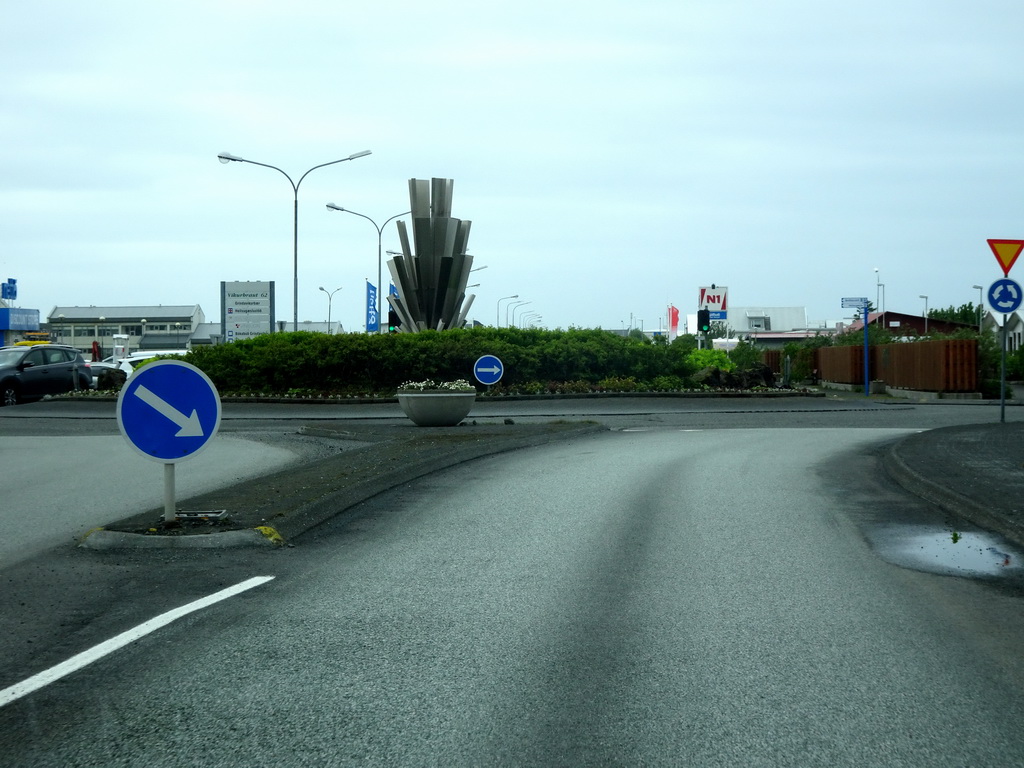 Roundabout at the north side of town, viewed from the rental car on the Grindavíkurvegur road