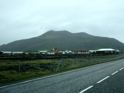 Houses at the north side of town, viewed from the rental car on the Grindavíkurvegur road