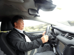 Miaomiao`s father driving our rental car on the Grindavíkurvegur road