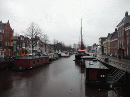 The Schuitendiep canal with boats, viewed from the Poelebrug bridge