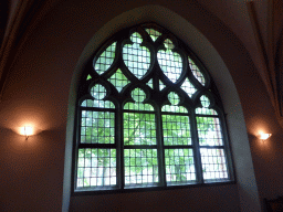 Window in the room at the north side of the Martinikerk church, with a view on the Martinikerkhof square