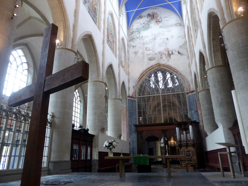 Apse with cross and altar, and the choir with organ of the Martinikerk church, viewed from the east side of the ambulatory
