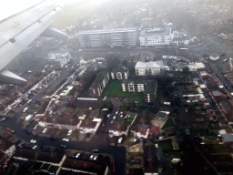 Bath Road with the Tesco Express, the Boeing UK headquarters and the Travelodge London Heathrow Central in the Crandford neighborhood of London, viewed from the airplane from Amsterdam to London
